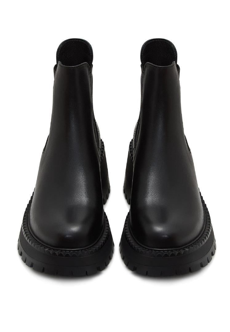 A stylish pair of black platform Chelsea boots, perfect for women looking for chunky and trendy footwear.
