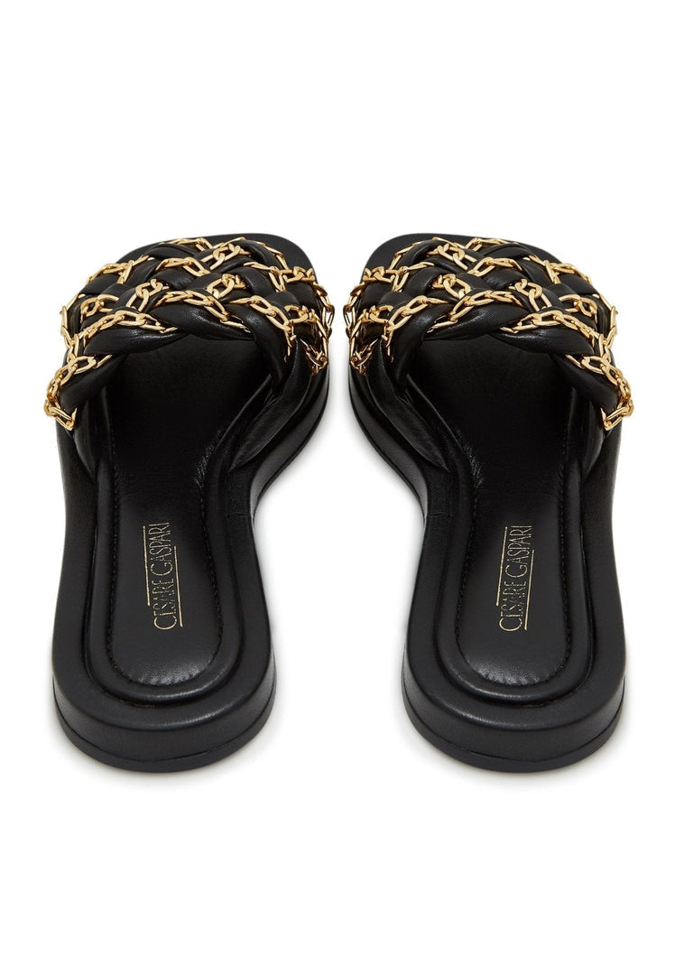 A stylish pair of black leather chain sandals for women, featuring intricate chain detailing perfect for summer vibes.