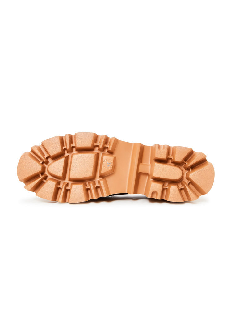 A pair of bold leopard print chunky platform loafers for women, making a stylish statement with their animal print design.