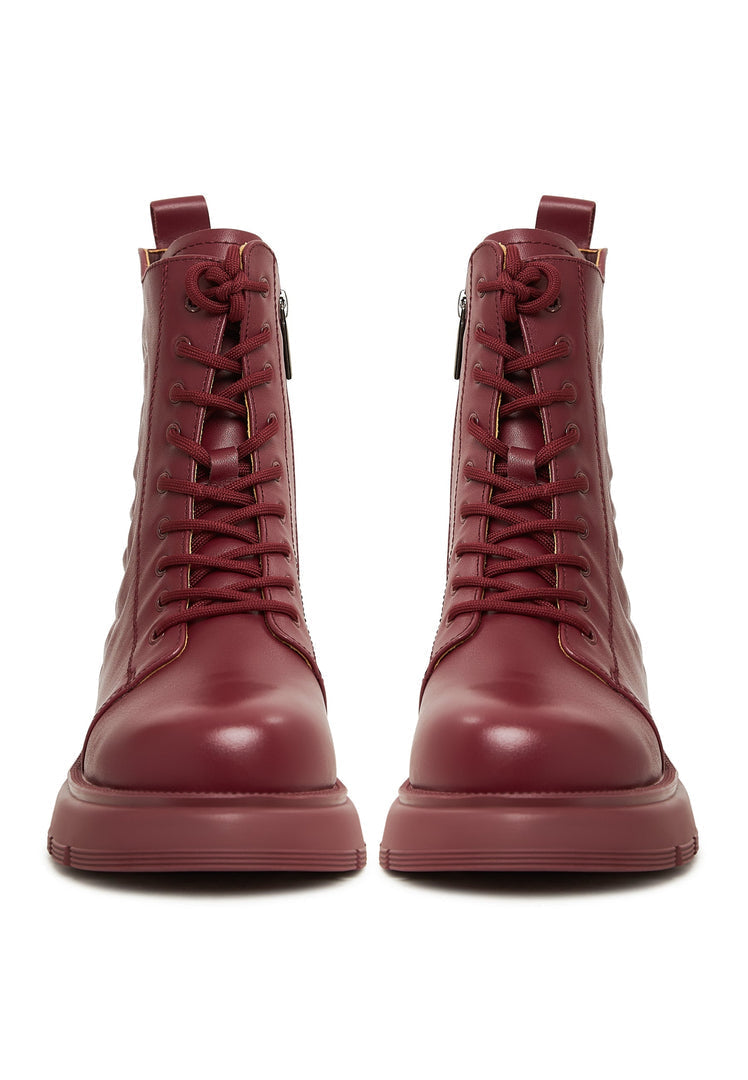 A stylish pair of women's high heel leather platform ankle boots in Bordeaux, perfect for fashionable footwear enthusiasts.