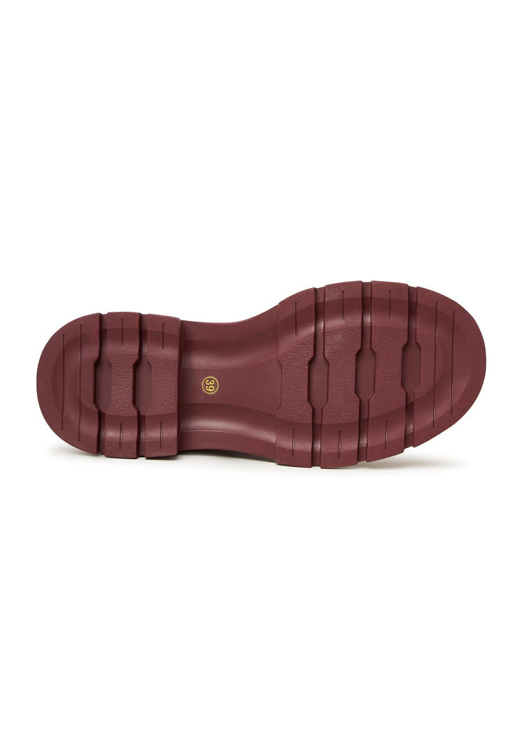 A stylish pair of Bordeaux leather platform ankle boots for women, designed with high heels and perfect for a fashionable look.
