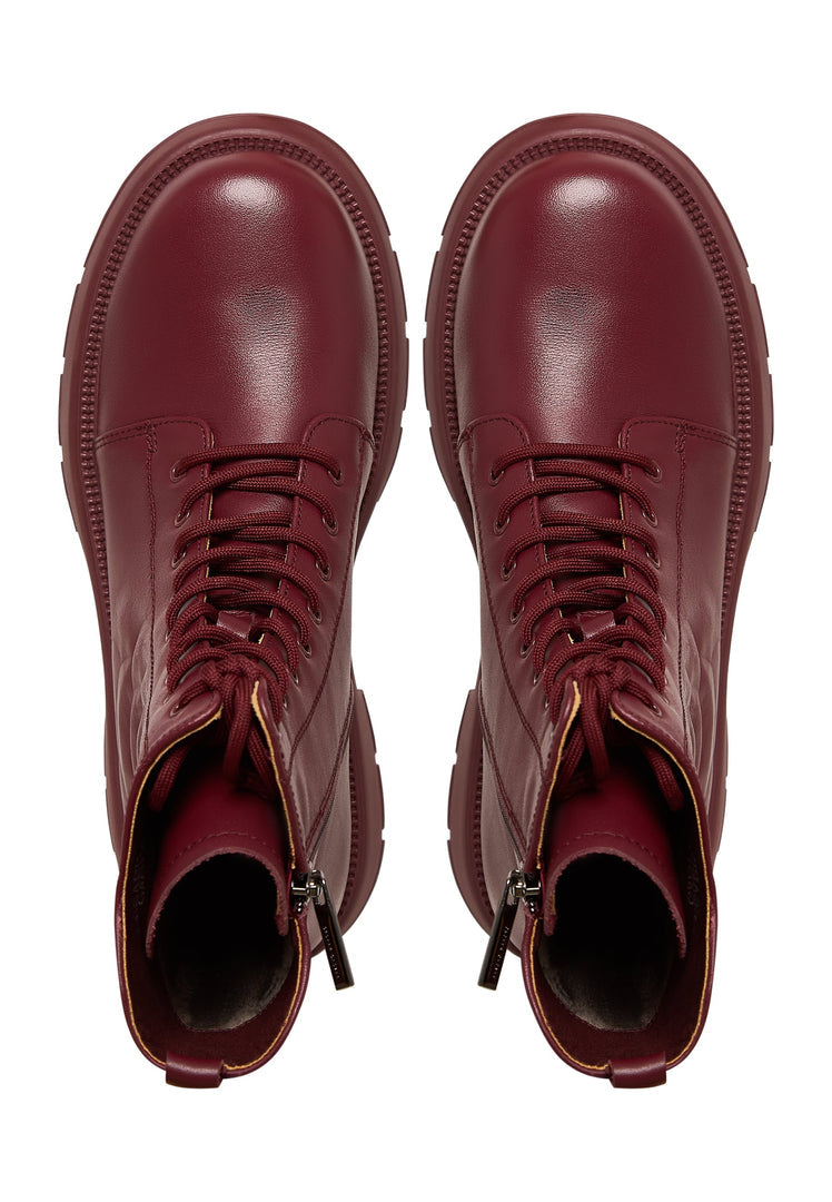 A stylish pair of burgundy leather platform ankle boots for women, featuring a high heel design and a trendy and fashionable look.