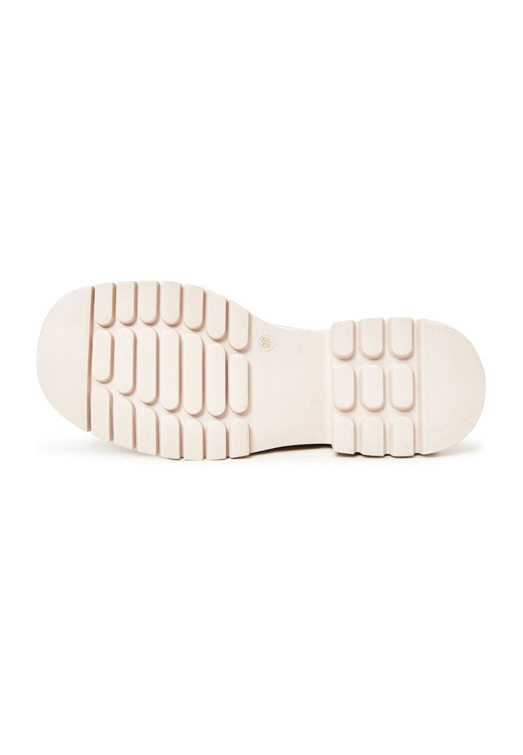 A stylish pair of beige block heels loafers for women, offering both fashion-forward design and comfortable wear.