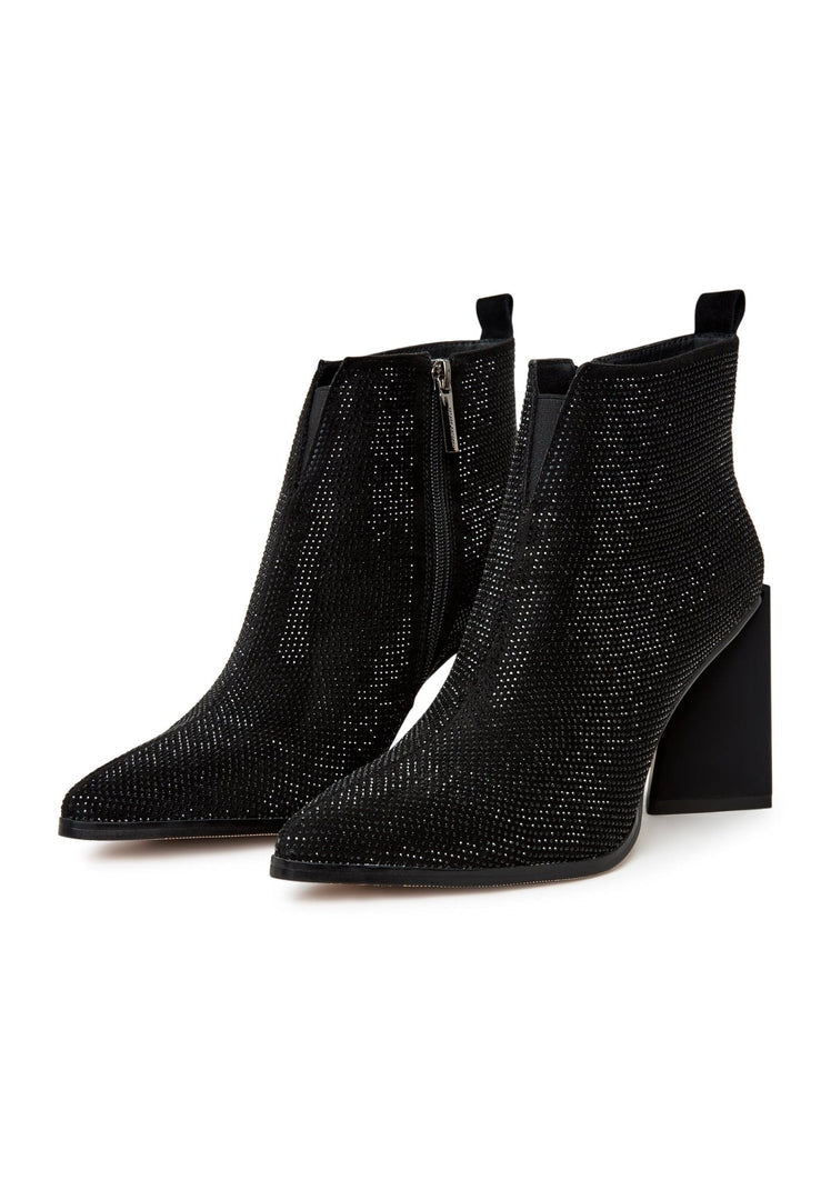 A pair of stylish black suede pointed toe ankle boots with a block heel, perfect for a chic and fashionable look.