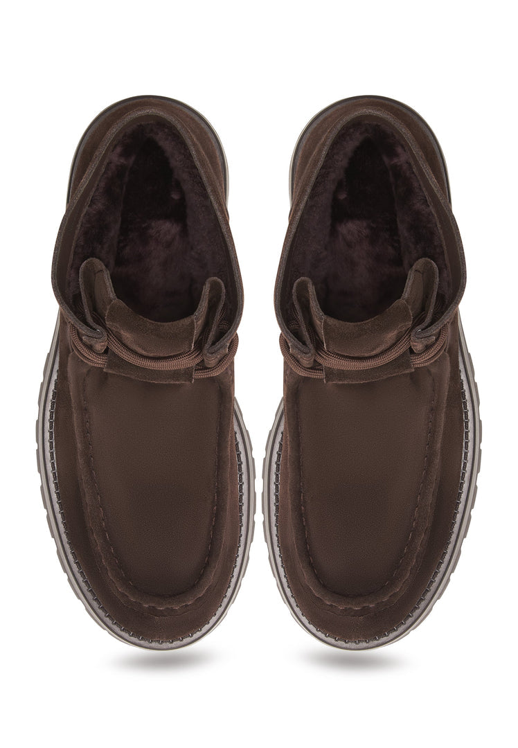 A close-up image of stylish brown suede lace-up ankle boots for women by Mavi, perfect for completing your fall/winter wardrobe.