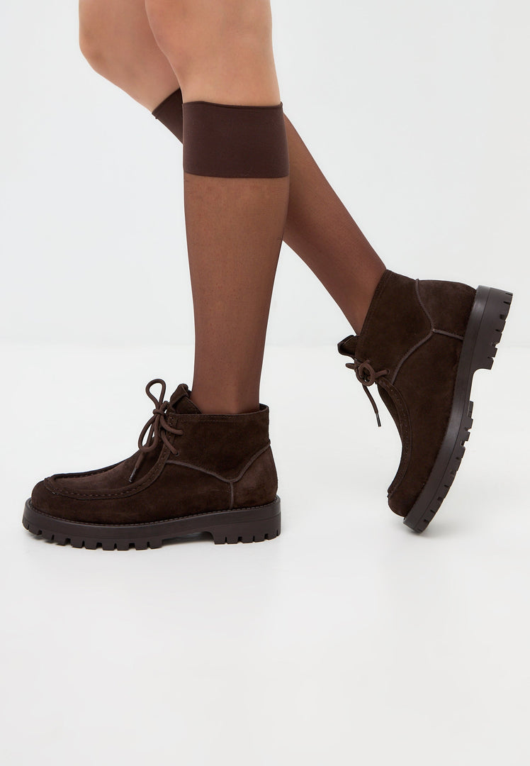 A stylish pair of brown suede lace-up ankle boots by Mavi, perfect for women's fashion.