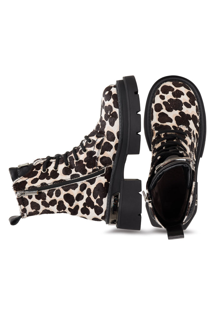 A pair of classic leather platform ankle boots in Luna leopard print, perfect for making a statement with these stylish platform ankle boots in a fashionable and fierce leopard print design.