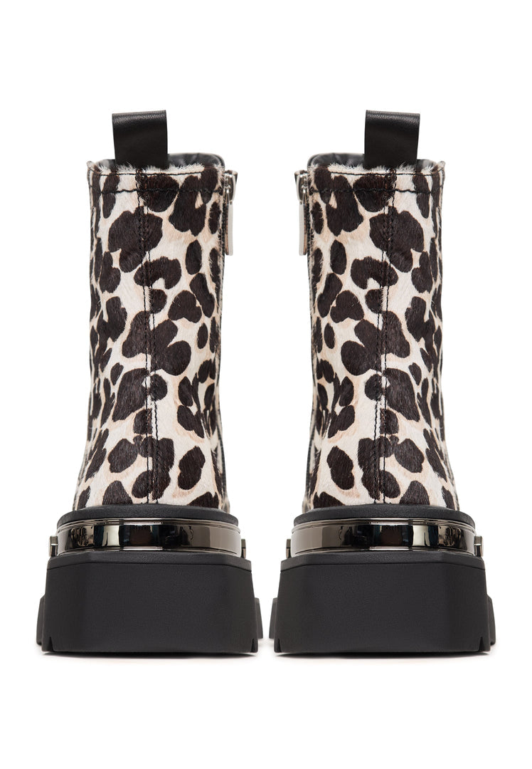 A stylish pair of classic leather platform ankle boots with a trendy leopard print design, perfect for adding a bold statement to any outfit.