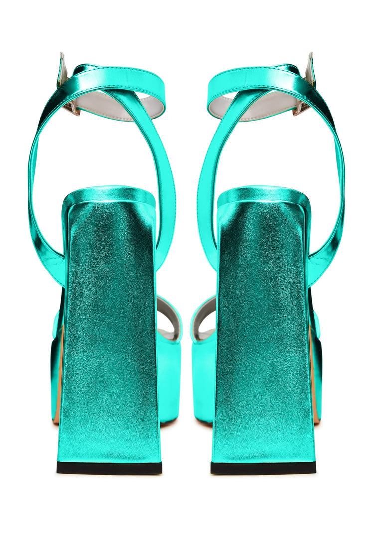 Step into summer with these fashionable luxury green sandals, showcasing elevated elegance and designer footwear style.