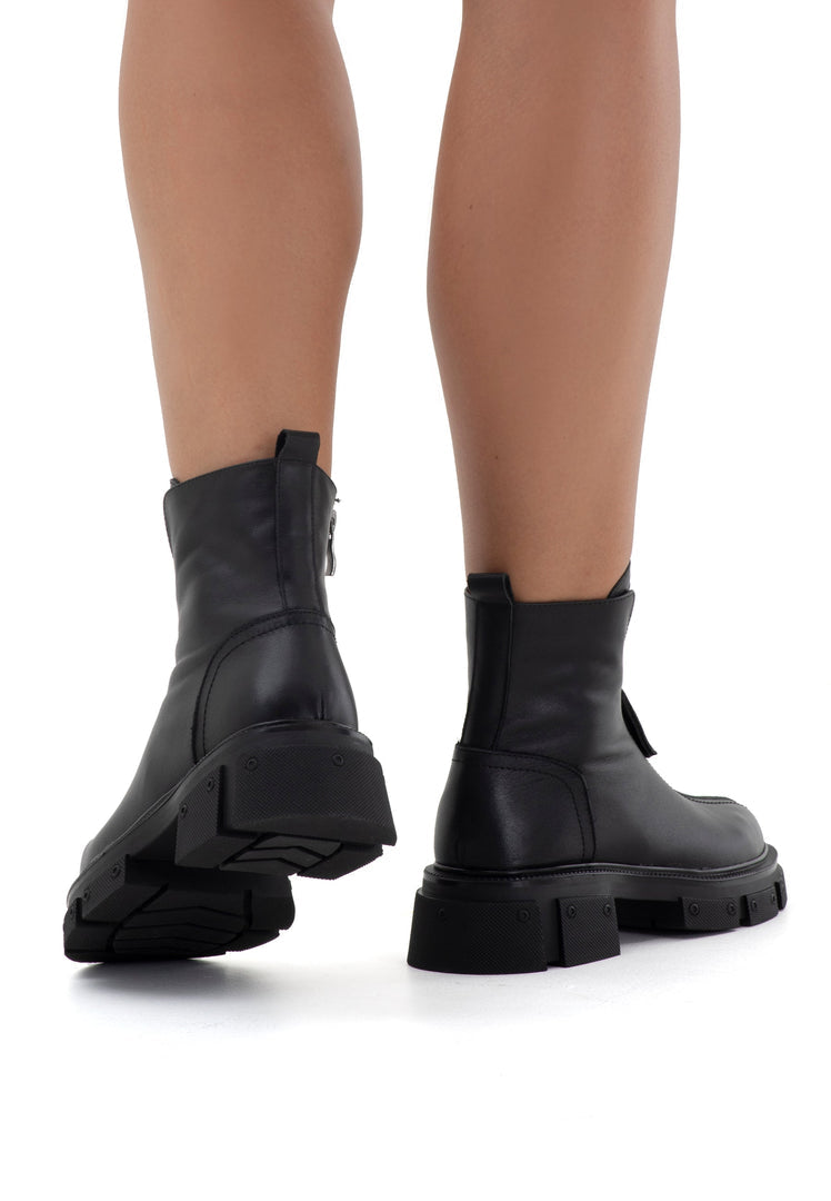 A stylish pair of fashion ankle boots for women in black, featuring a chic block heel design – perfect as classic ankle boots for any occasion.