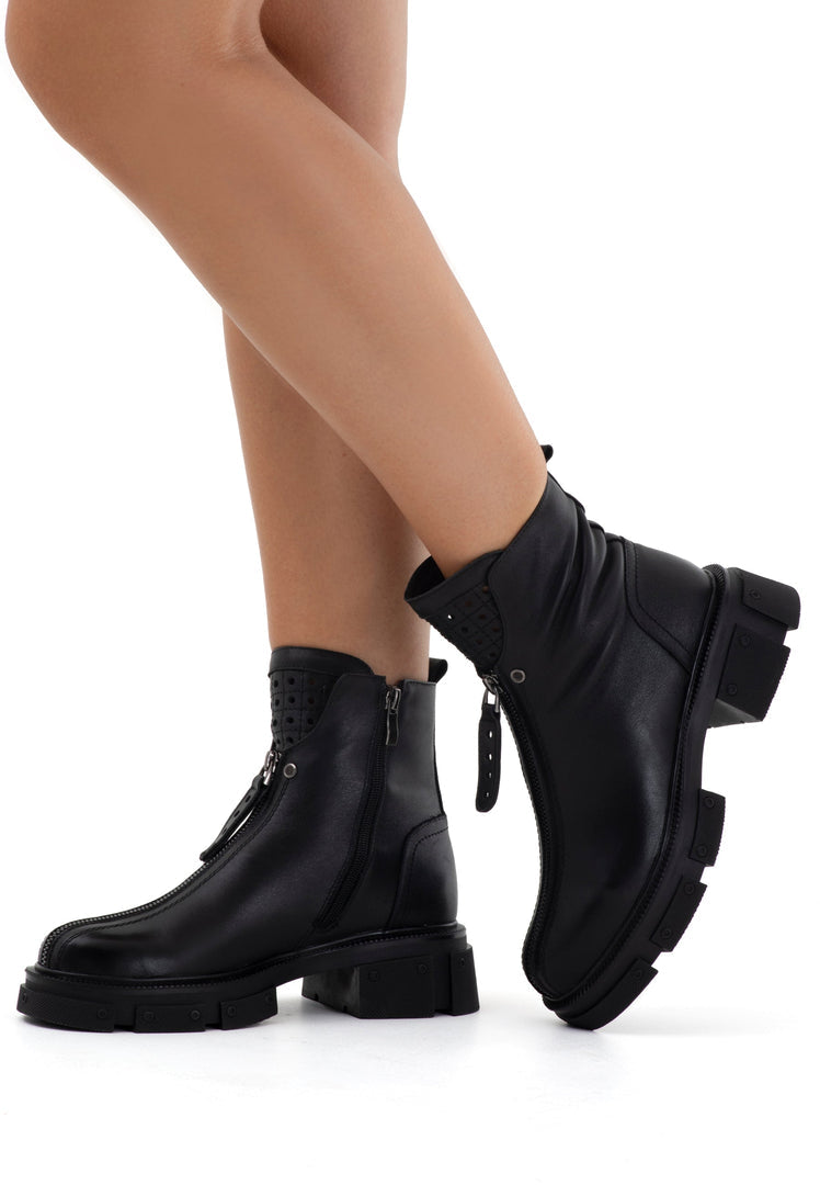 A stylish pair of black block heel ankle boots, perfect for any outfit. Classic ankle boots with a modern twist, these block heel boots are a must-have for fashionable women.