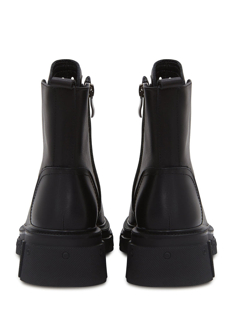 A stylish pair of black block heel ankle boots for women, a classic and fashion-forward choice for any outfit.