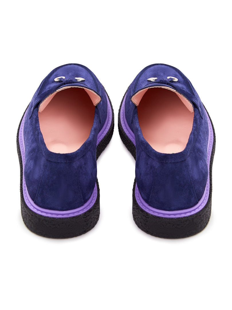 A sleek pair of navy blue slip-on suede loafers for men, perfect for those seeking a stylish and sophisticated footwear option.