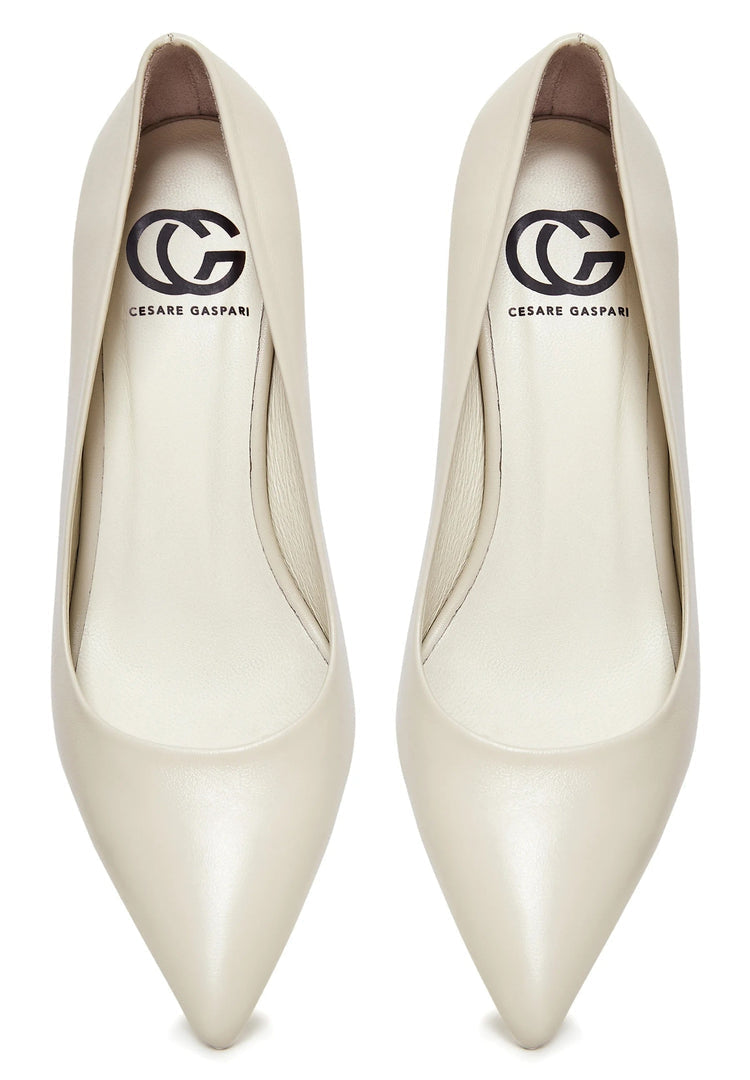 "Pair of elegant luxe off white pumps, ideal as luxe heels or designer pumps for a white wedding."