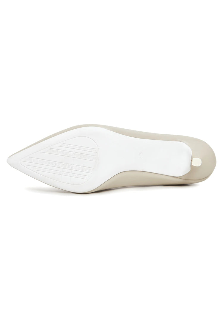 A pair of elegant luxe off white pumps, perfect for a luxe heels lover or a white wedding. These designer pumps are a must-have for any fashion-forward individual.