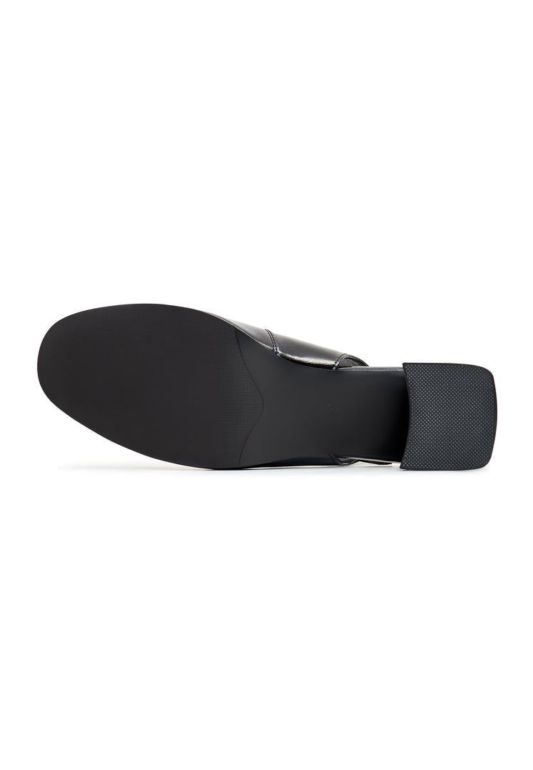 A stylish pair of black Slingback pumps by Nina shoes, perfect for any women's outfit. These designer heels are a must-have for any fashion-forward wardrobe.