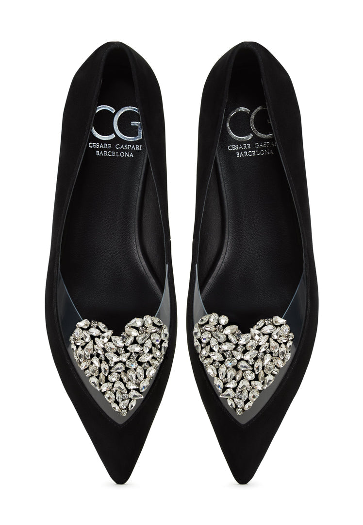 A stylish pair of flat sole black Camila ballerinas, perfect for women looking for comfortable ballet flats.