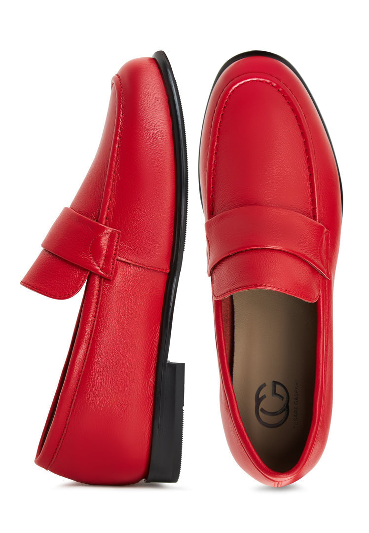 A stylish pair of red leather Abigail loafers with block heels.