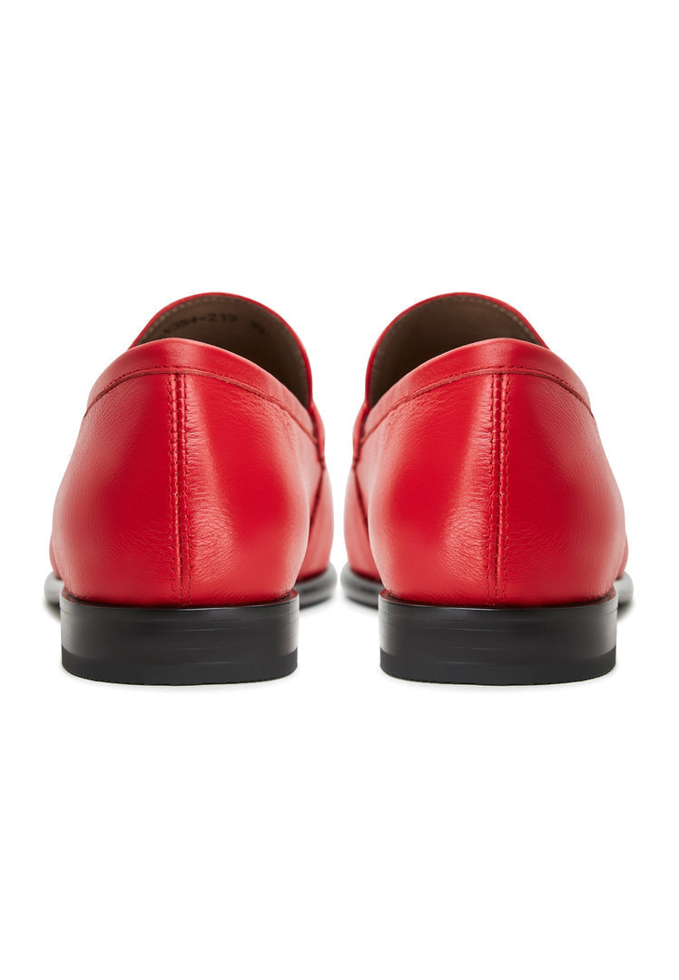 A stylish pair of red leather loafers with block heels, known as Abigail loafers, perfect for adding a pop of color to your outfit.