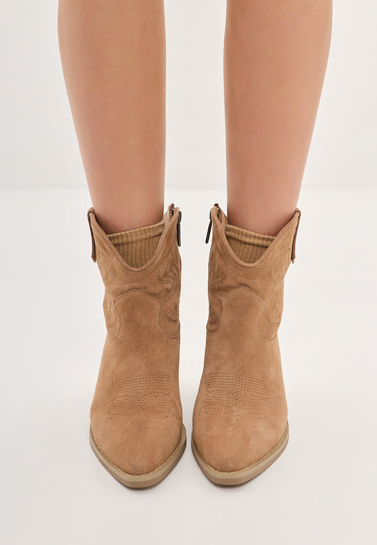 A pair of stylish women's suede cowboy boots in Natalie brown color, perfect for adding a touch of Western style to your cowgirl fashion wardrobe.
