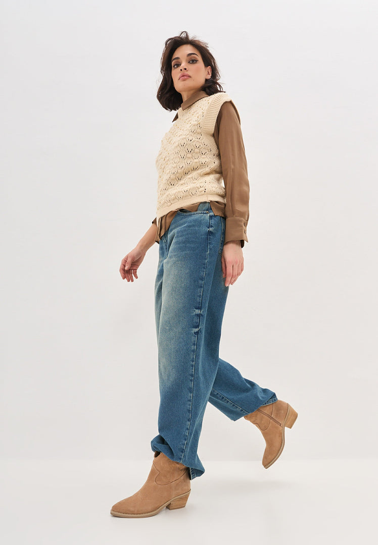 A pair of stylish Natalie brown suede cowboy boots, perfect for adding a touch of Western flair to any outfit.