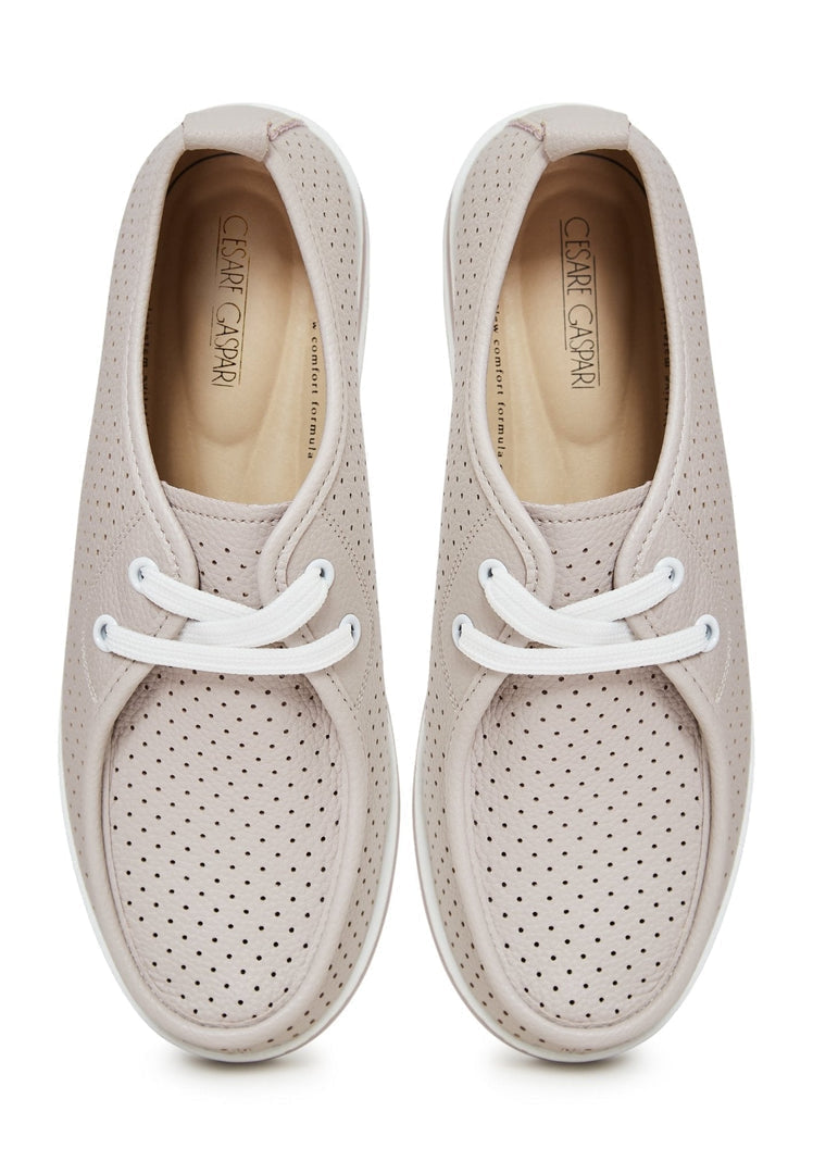 A pair of beige leather platform loafers - classic, comfortable, and stylish women's shoes.