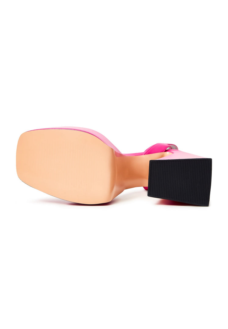 A stylish pair of pink sandals for women, perfect for summer days with an elevated elegance touch.