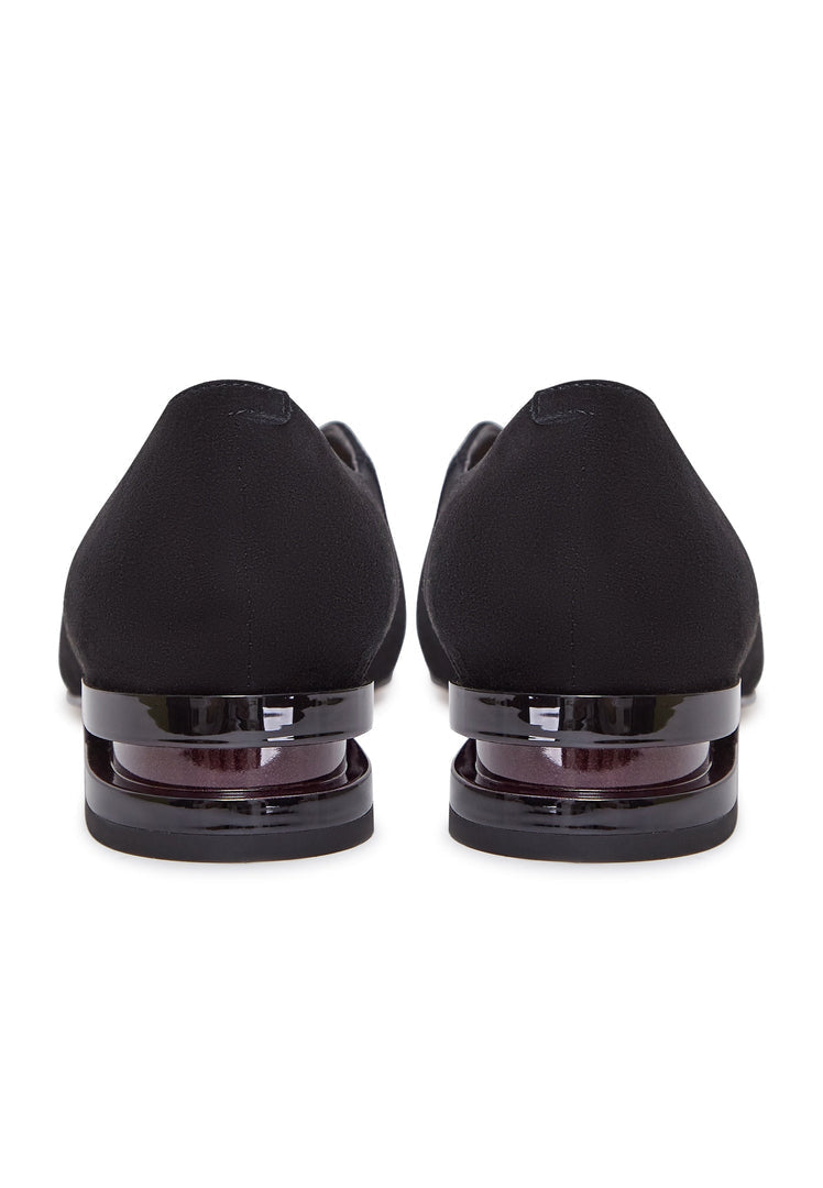 A trendy pair of women's suede ballerinas in black with stylish pointed tips, perfect for any outfit.