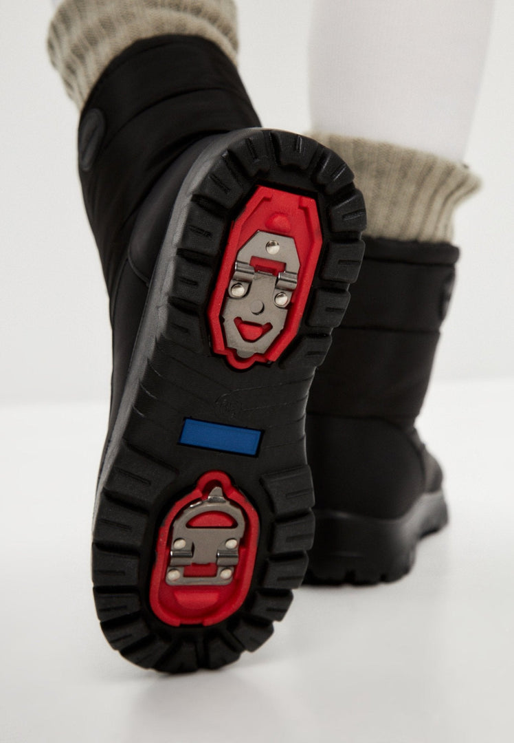 Stay warm and cozy this winter with these fur-lined, insulated, and waterproof snow grips winter boots.