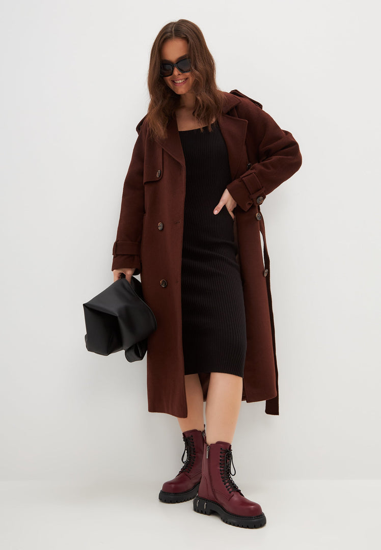 A pair of stylish lace-up combat boots with a chunky sole in trendy Bordeaux color, perfect for women's fashion footwear.