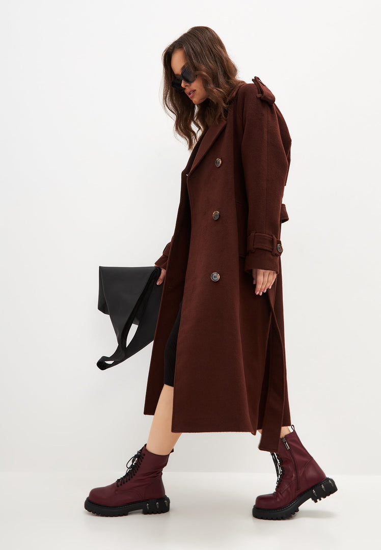 A pair of stylish lace-up combat boots with chunky soles in Bordeaux color, perfect for women's fashion footwear.