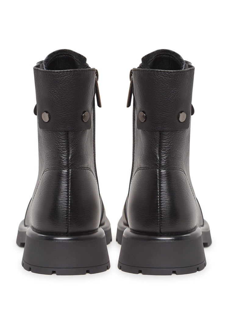 A trendy pair of lace-up ankle boots with a platform sole, perfect for women's fashion footwear.