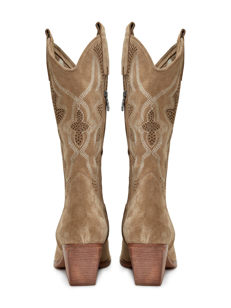 A pair of light brown, handcrafted leather cowboy boots with intricate embroidery, showcasing a unique Western style footwear design.