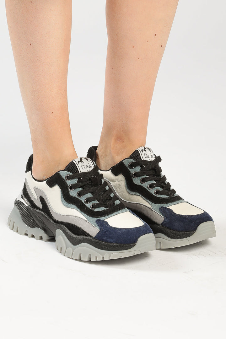 A stylish collage featuring multi-panel, chunky, and trendy fashion sneakers, making a bold statement in footwear fashion.