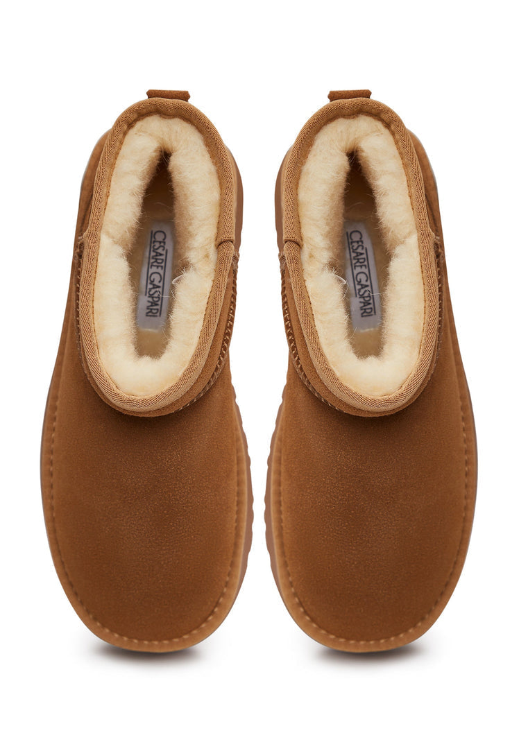 A stylish pair of brown suede winter platform boots, perfect for adding a fashionable flair to your winter outfits.