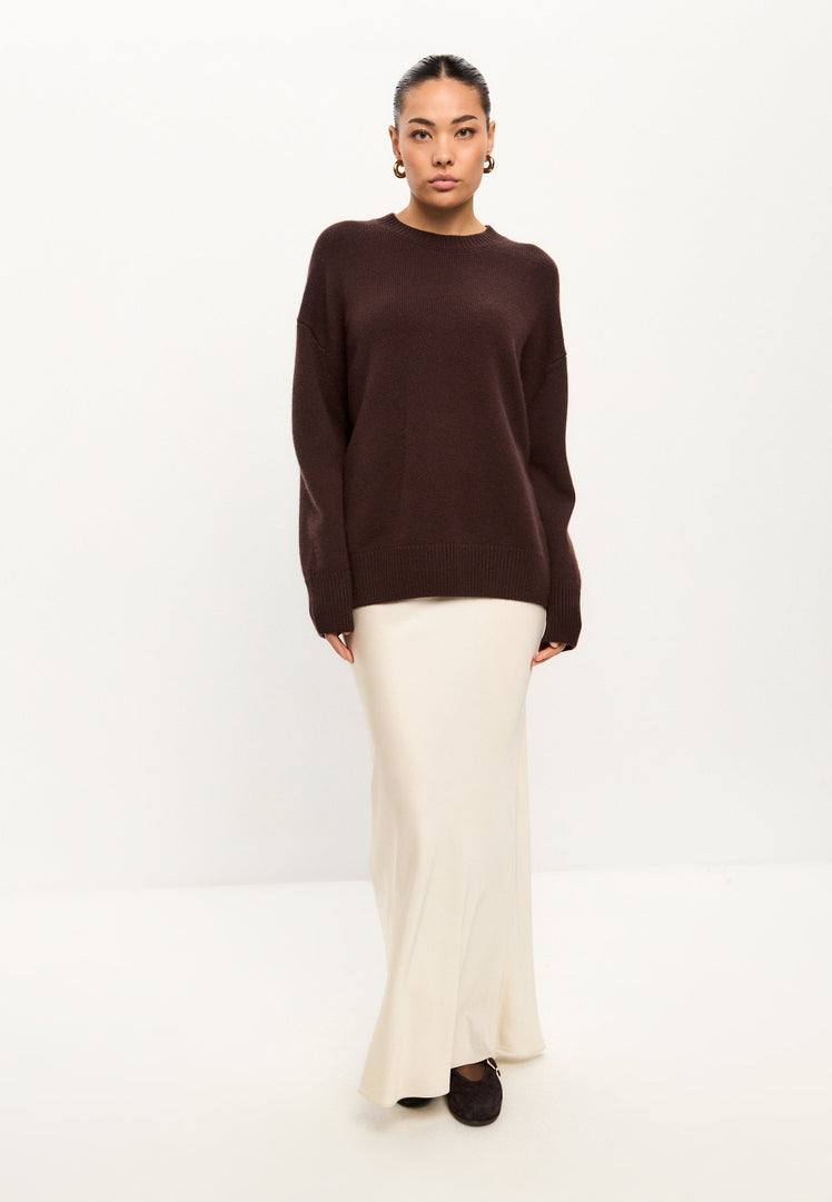 Stay cozy and stylish this winter with a women's Mulan brown classic crew neck sweater, perfect for casual knitwear and on-trend winter fashion.