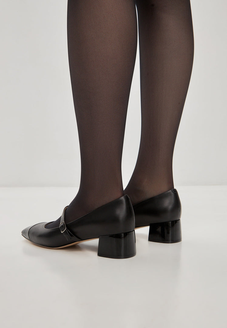 A chic pair of black Mary Jane heels, perfect for a classy and timeless look.