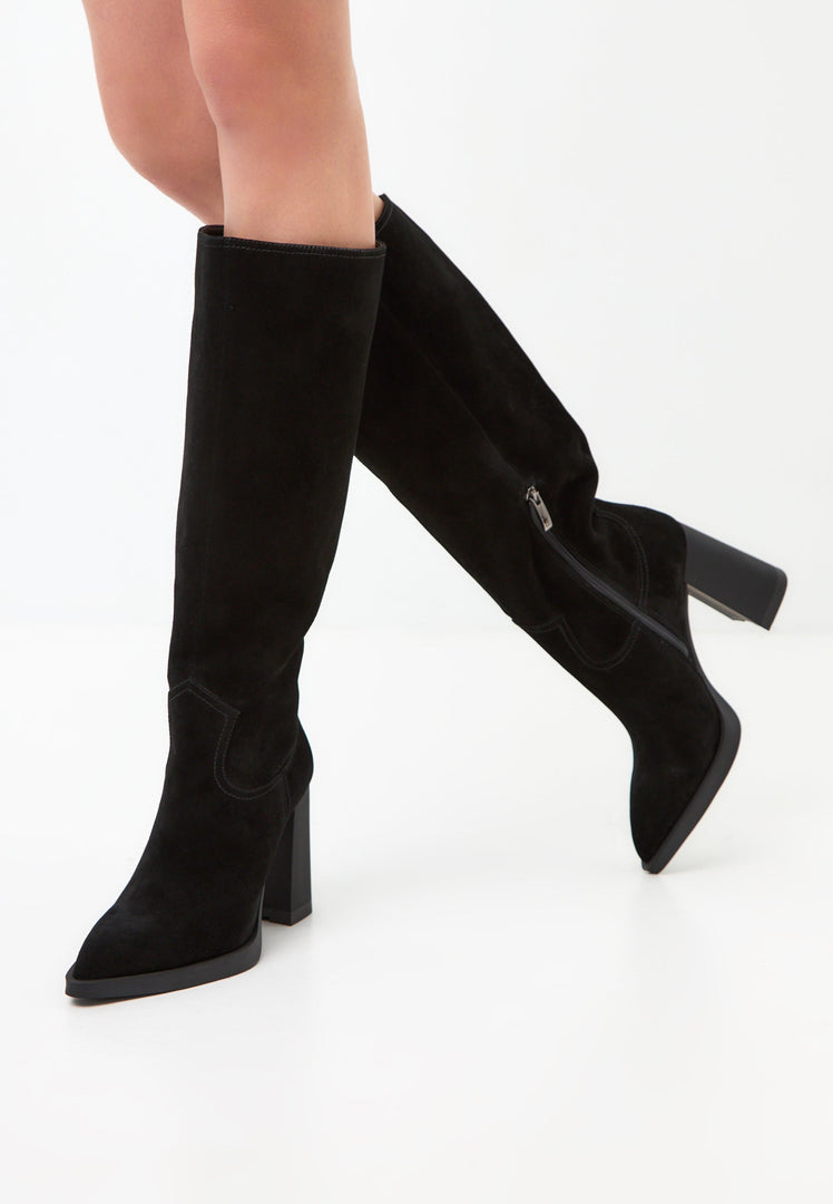 A chic pair of knee-high black block heel boots for an elegant and stylish look, also known as Bambi boots.