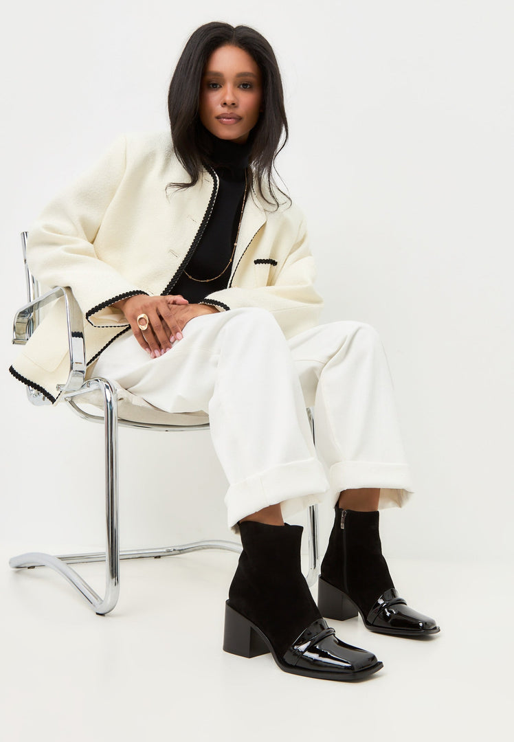 A chic pair of black Wren high heel block ankle boots for women.