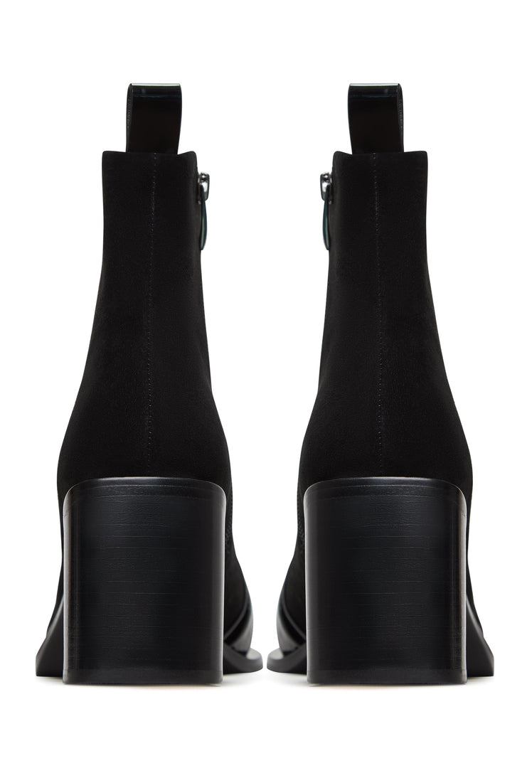 A stylish image of black women's block heel ankle boots, featuring the trendy Wren design with a high heel for a chic and comfortable look.