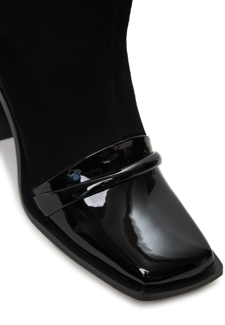 A stylish pair of black block heel Wren ankle boots - perfect for a chic look.