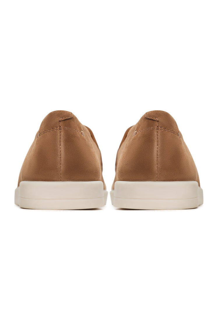 A pair of stylish beige low platform loafers - perfect casual footwear for women featuring the Alaska touch.