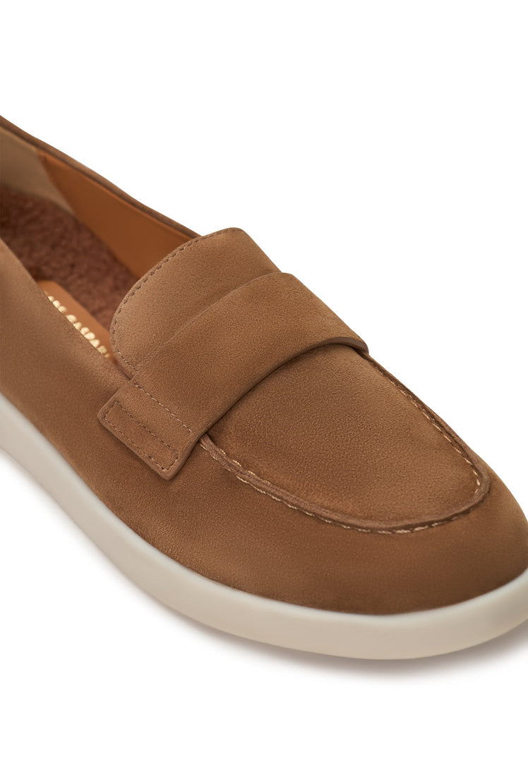 A pair of stylish low platform loafers in beige, perfect for casual wear in Alaska, ideal women's footwear option.