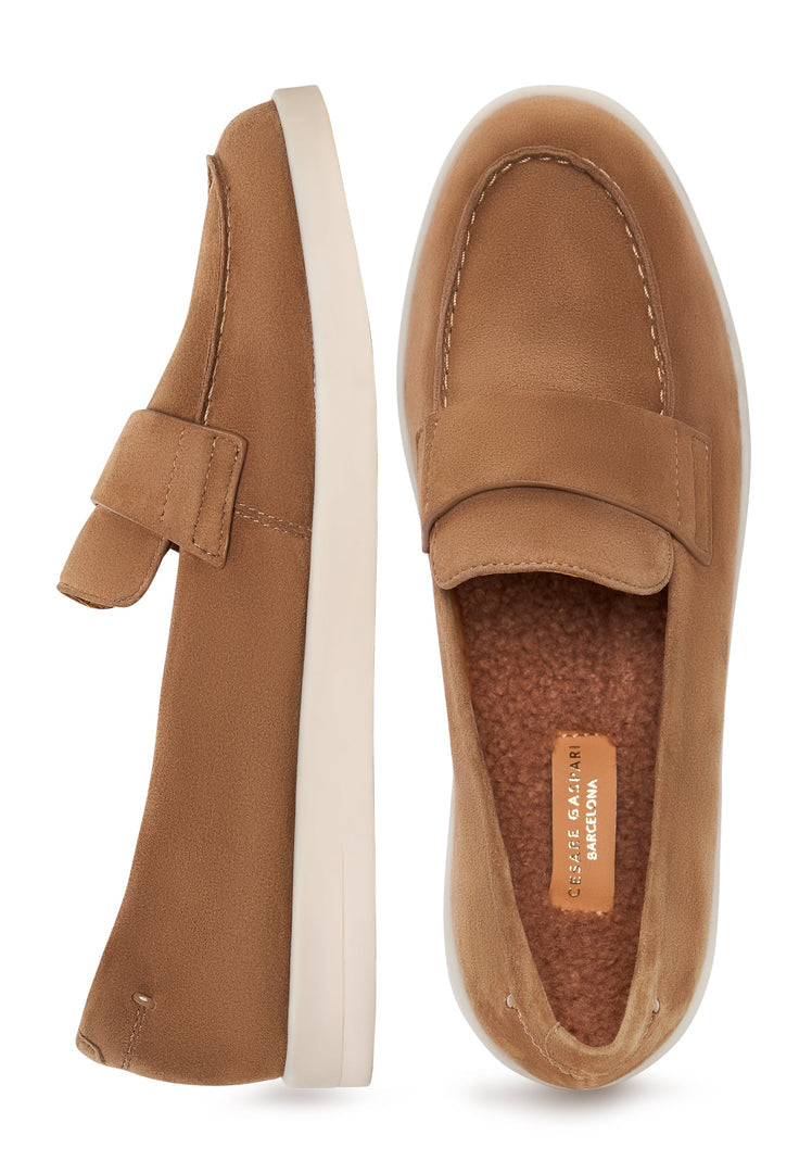 A pair of women's beige low platform loafers, perfect for casual outings in Alaska.
