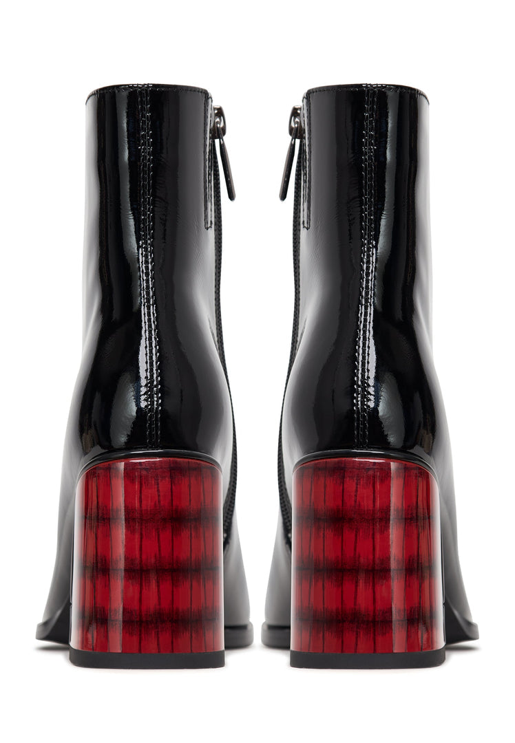 A stylish pair of women's soft leather Ella heel boots in patent black, perfect for any outfit.