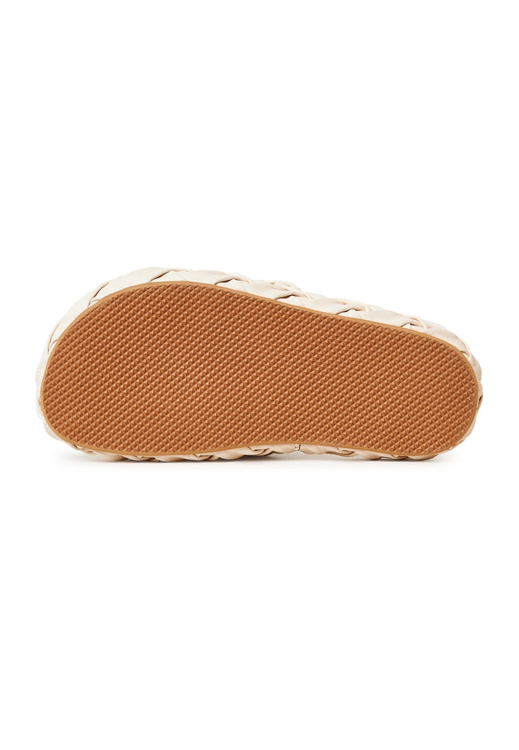A pair of stylish beige platform slippers, known as Antonella platform sandals, for women - the perfect trendy and fashionable footwear.