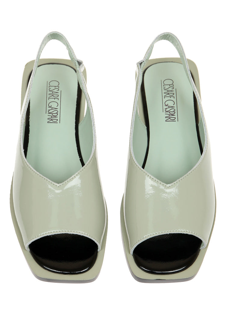 A stylish pair of open toe leather sandals, perfect for summer wear as urban fashion footwear.