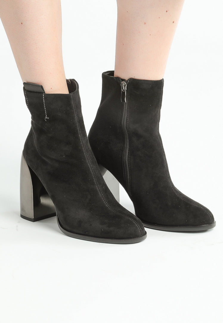 A pair of stylish black suede ankle boots with a trendy square heel for women's fashion.