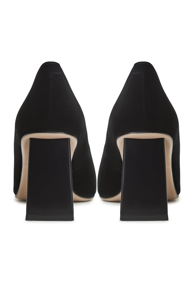 A stylish pair of black chunky heel pumps known as the Silvia pumps, perfect for any woman's wardrobe.