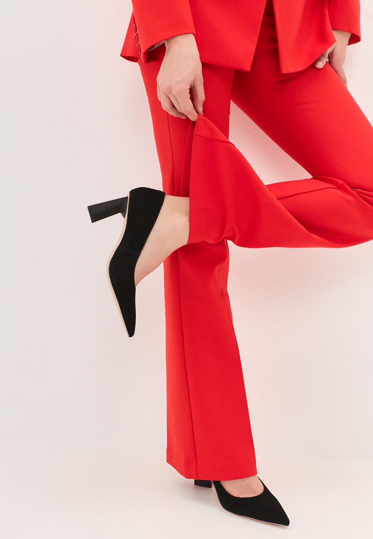 A pair of stylish black block heels pumps known as Silvia pumps for women with chunky heels design.